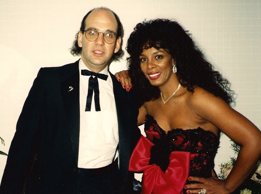 Jeff Ganz of the Hit Men with Donna Summer at an early 90s charity event they played.